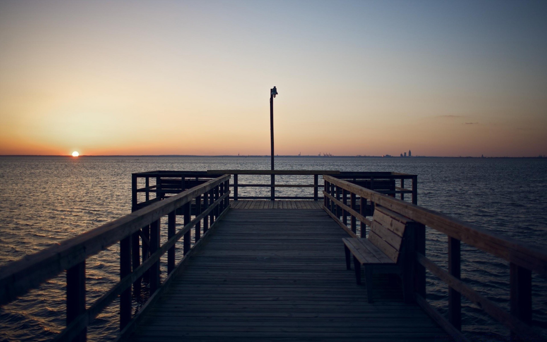 meer und ozean wasser sonnenuntergang pier meer ozean dämmerung strand licht liegeplatz reisen abend brücke sonne himmel dämmerung landschaft promenade im freien see