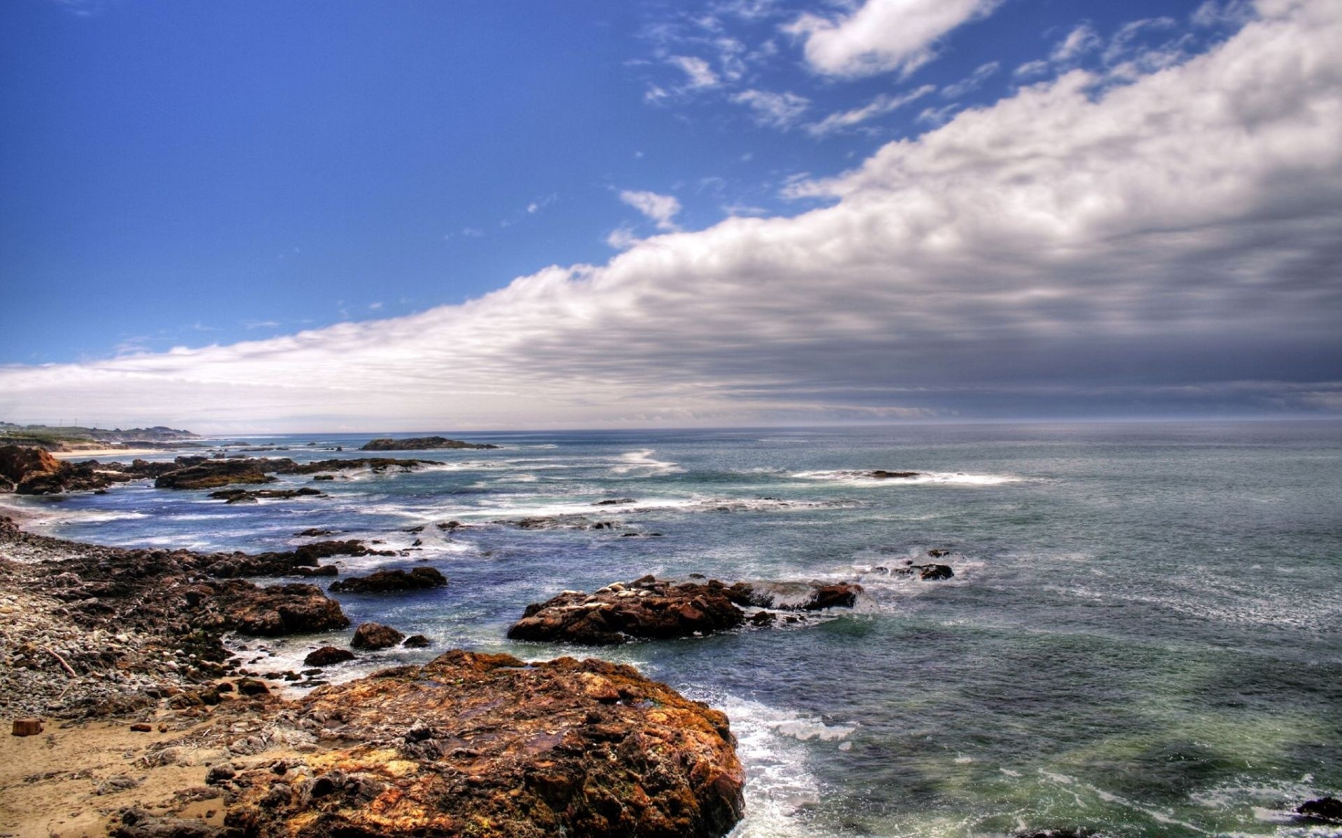 sea and ocean water sky sea travel nature seashore outdoors beach ocean summer landscape sand rock fair weather surf seascape