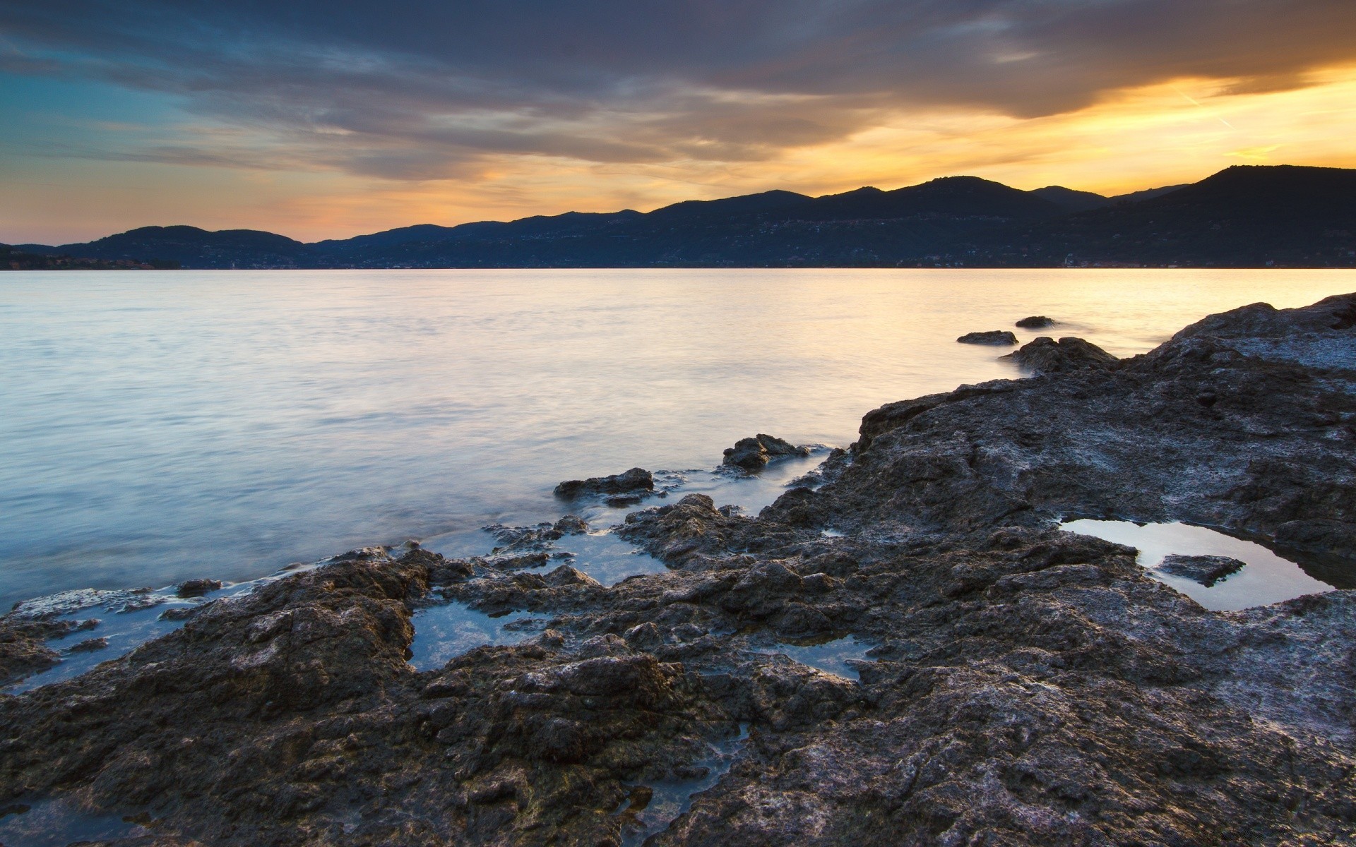 sea and ocean water landscape sea seashore sky sunset rock beach ocean travel outdoors nature seascape lake reflection mountain island scenic