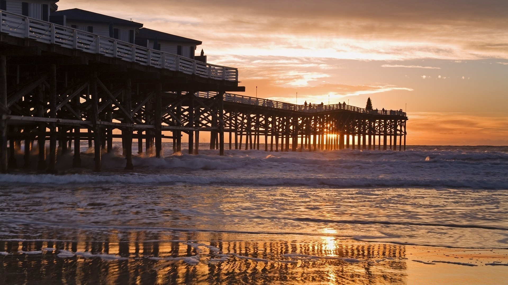 sea and ocean water sunset beach sea ocean dawn pier evening dusk seashore travel jetty reflection sky sun