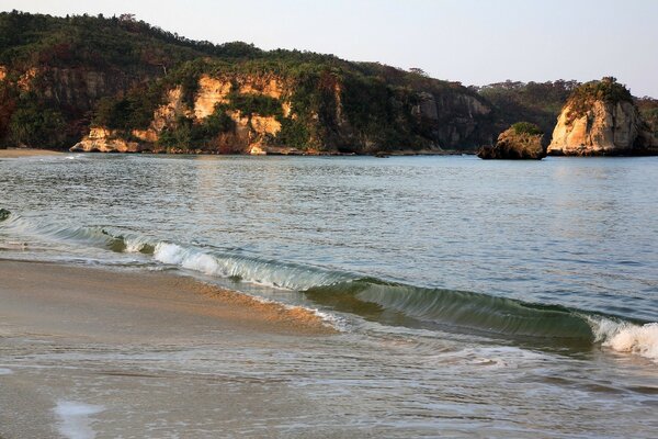 Landscape: beach, waves and rocks