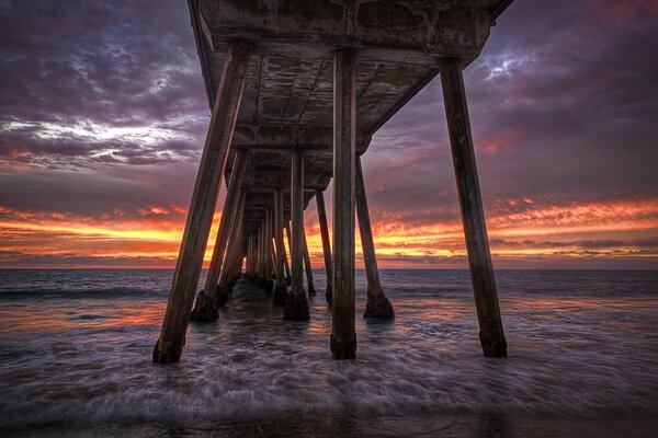 Sea and ocean. A bridge stretching into the distance