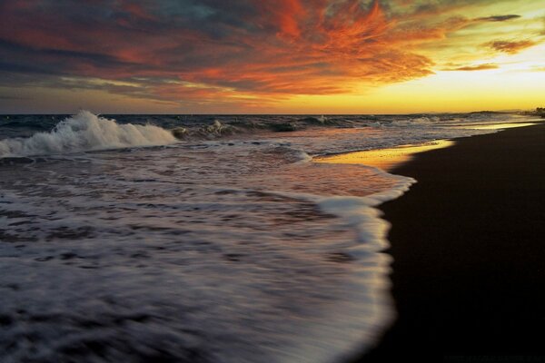 Sea surf at sunset