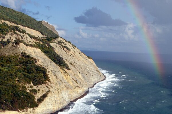 Rainbow staircase from the ocean to the sky