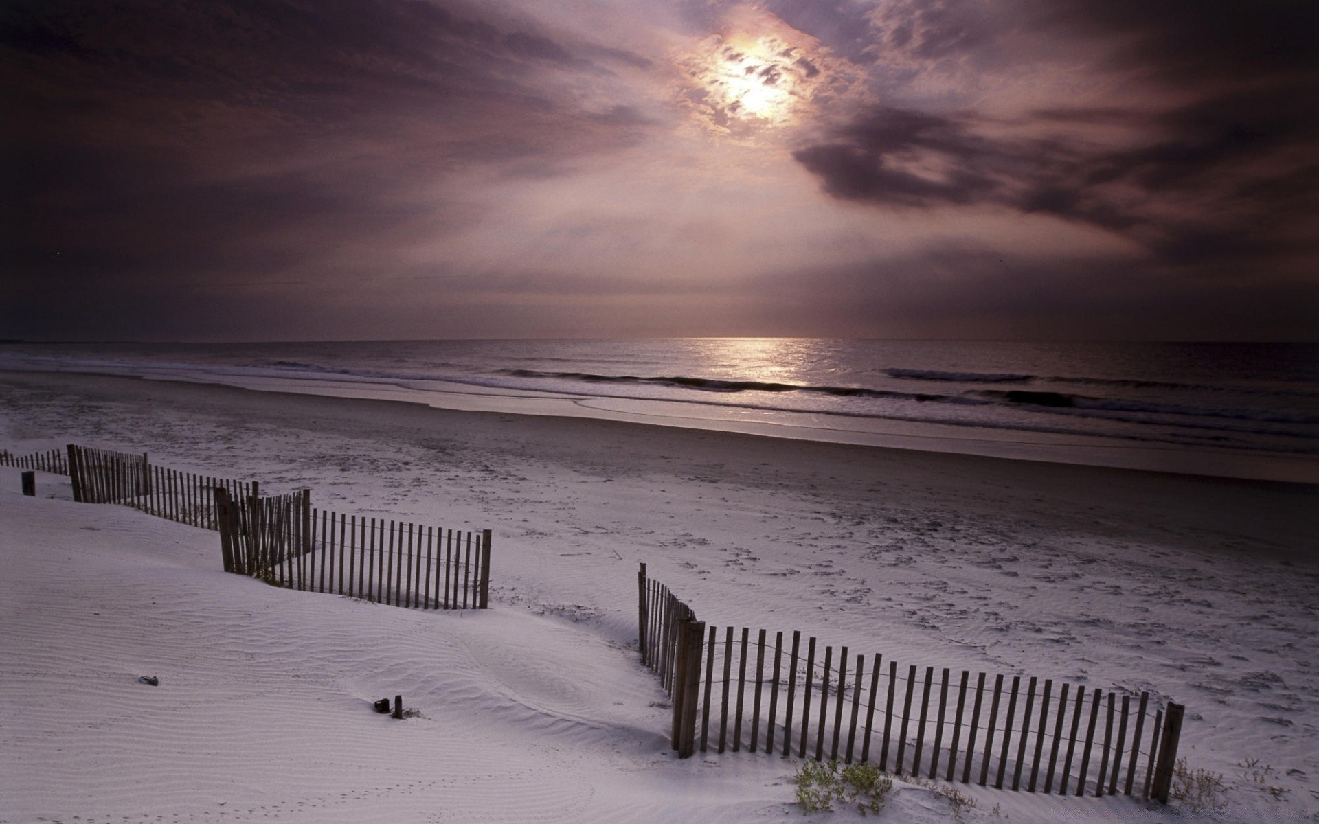 sea and ocean beach water sunset sand sea dawn sun ocean surf travel seashore evening dusk winter sky fair weather seascape outdoors storm