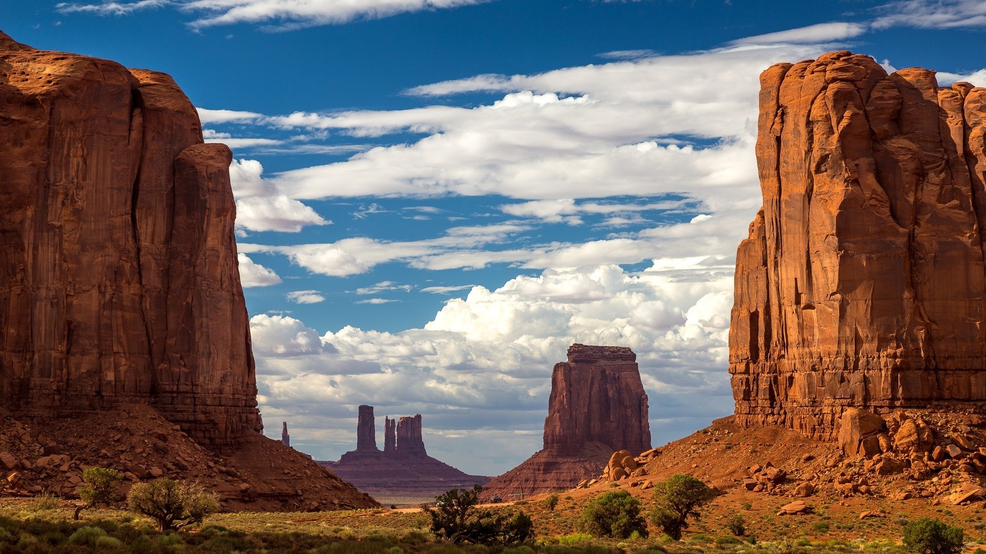 desert sandstone rock travel geology outdoors monolith pinnacle canyon landscape valley erosion arid remote scenic tribal cliff sky geological formation