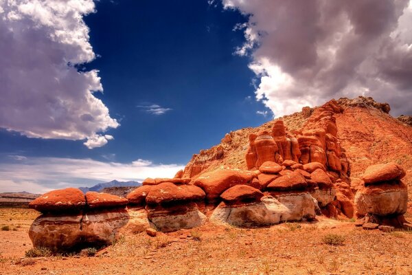 Low mountains against the sky with clouds