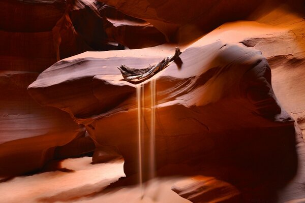 The cave fascinates with the view, while the sand