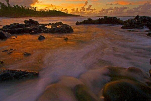 Water river stones in the water sky beach