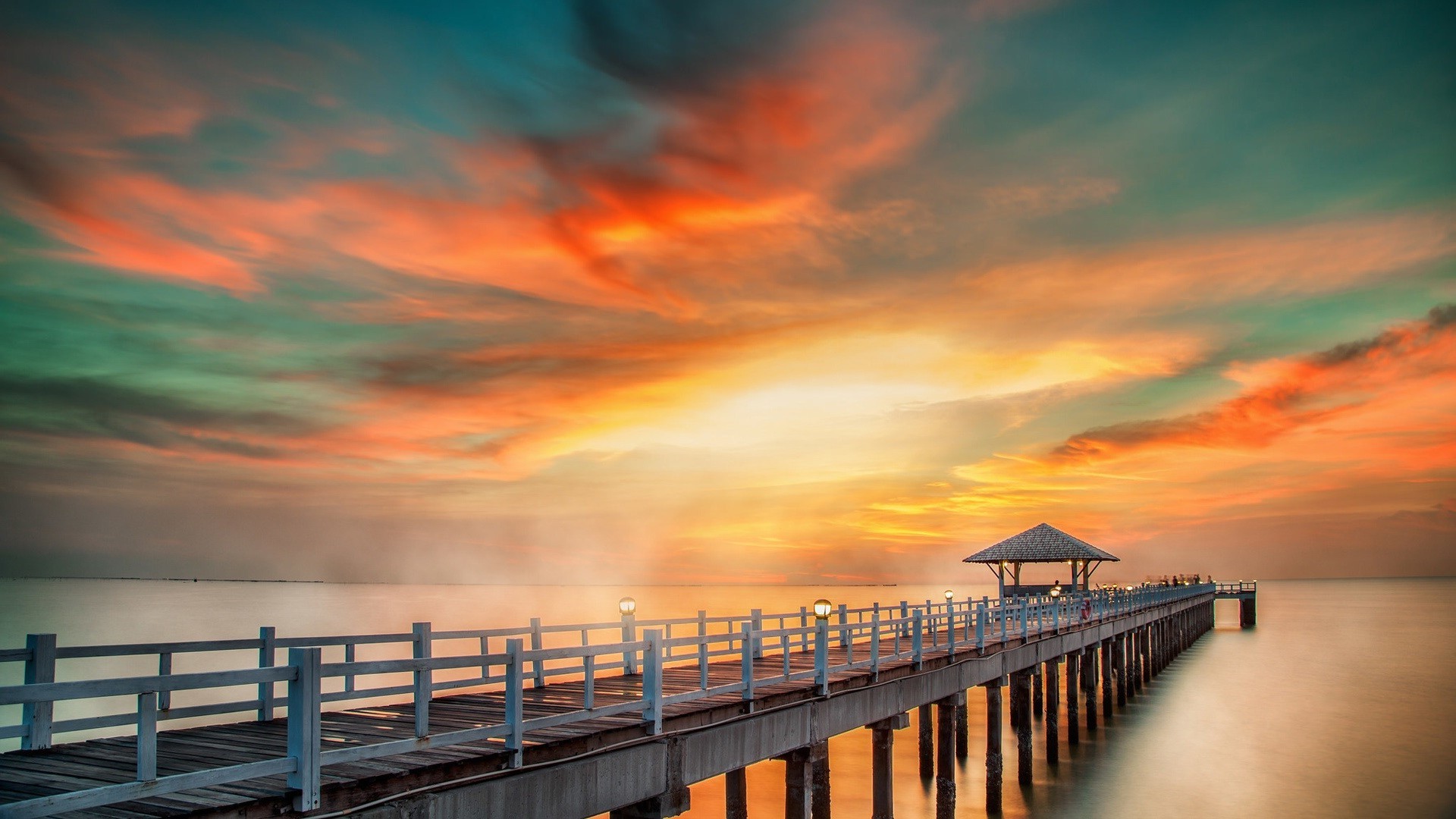 sea and ocean sunset water dawn dusk sea beach sky sun evening ocean travel pier bridge outdoors jetty light seashore