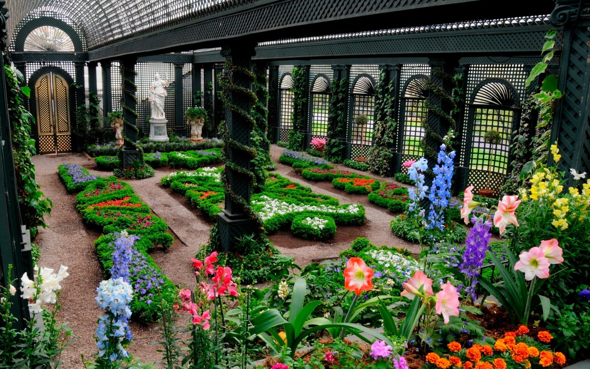 flores flor jardín flora patio horticultura naturaleza conservatorio verano casa color parque horticultura cama piedra decoración macizo de flores formal arquitectura botánico