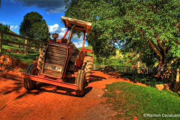 Tractor at a tree in the open air