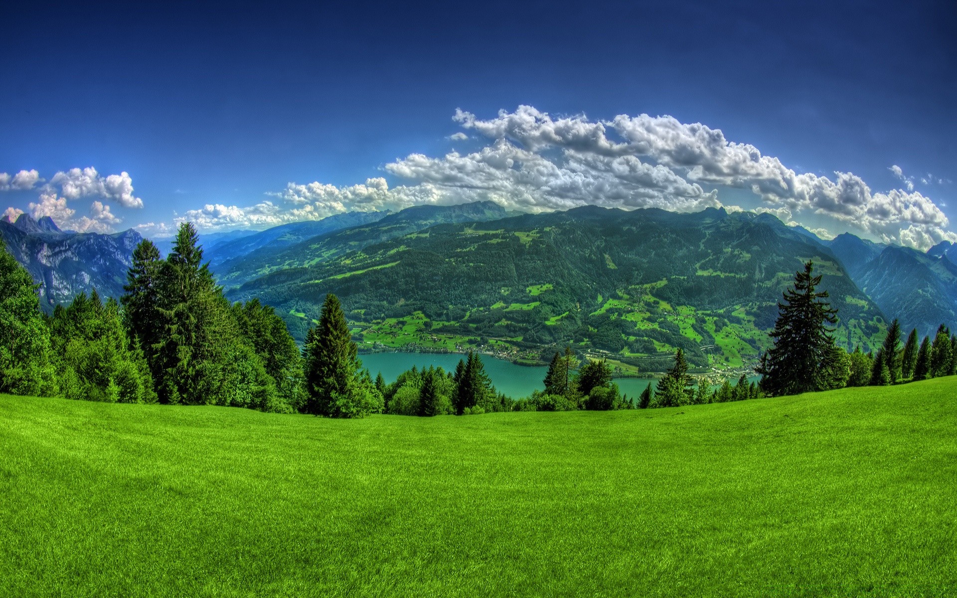 landschaft gras landschaft heuhaufen natur baum im freien holz weide himmel hügel des ländlichen sommer berge landschaftlich feld gutes wetter weide landschaft spektakel