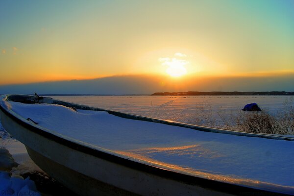 Early dawn over a frozen lake