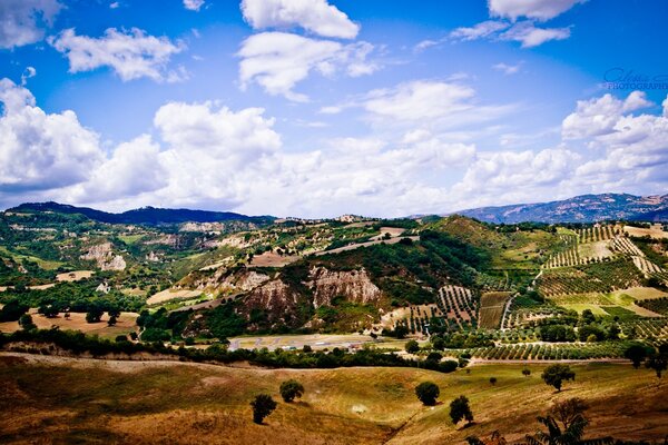 Landscape of grassy mountains and sky