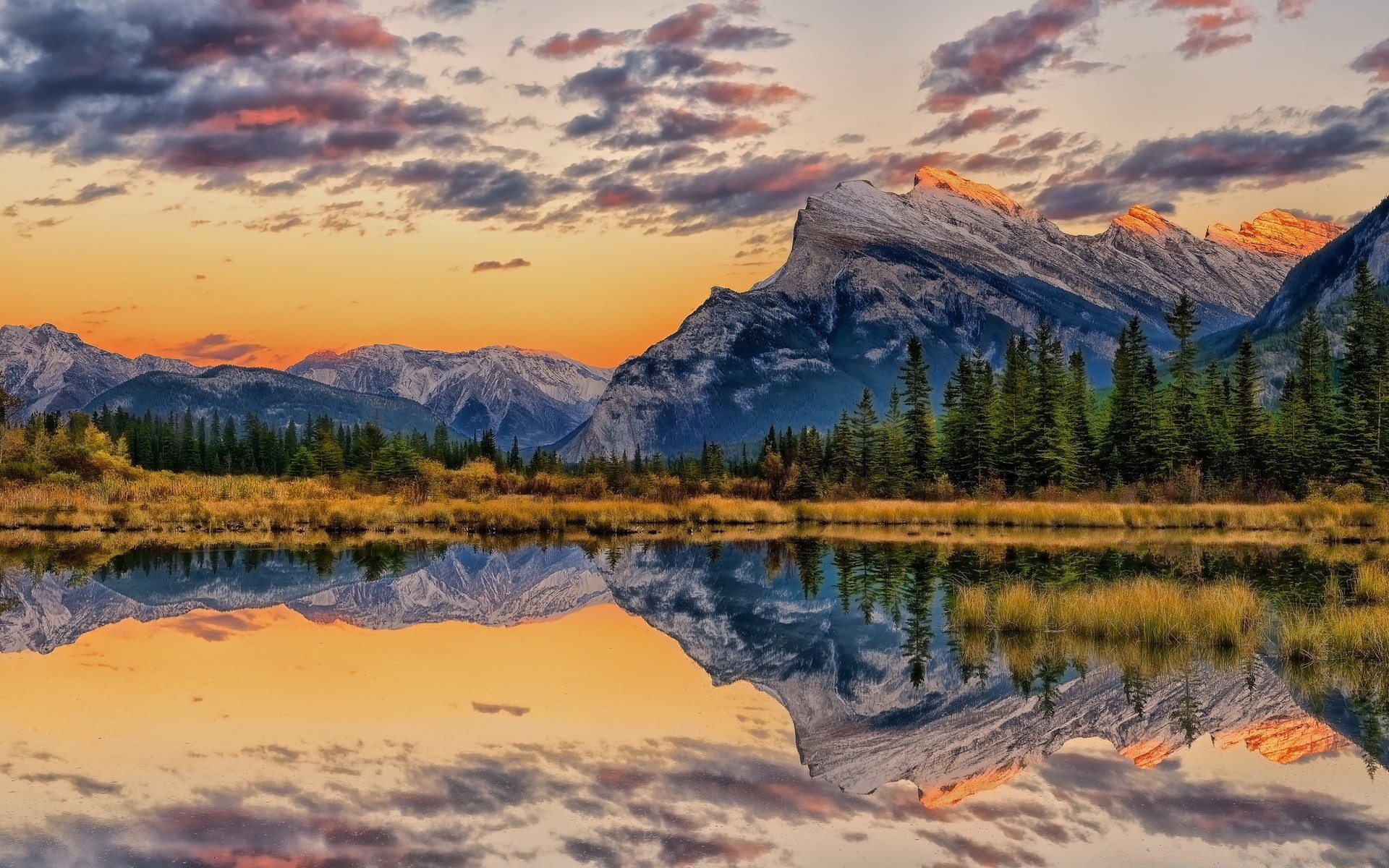 montañas reflexión lago montañas amanecer nieve paisaje agua escénico puesta de sol naturaleza viajes cielo al aire libre majestuoso noche valle pico de montaña