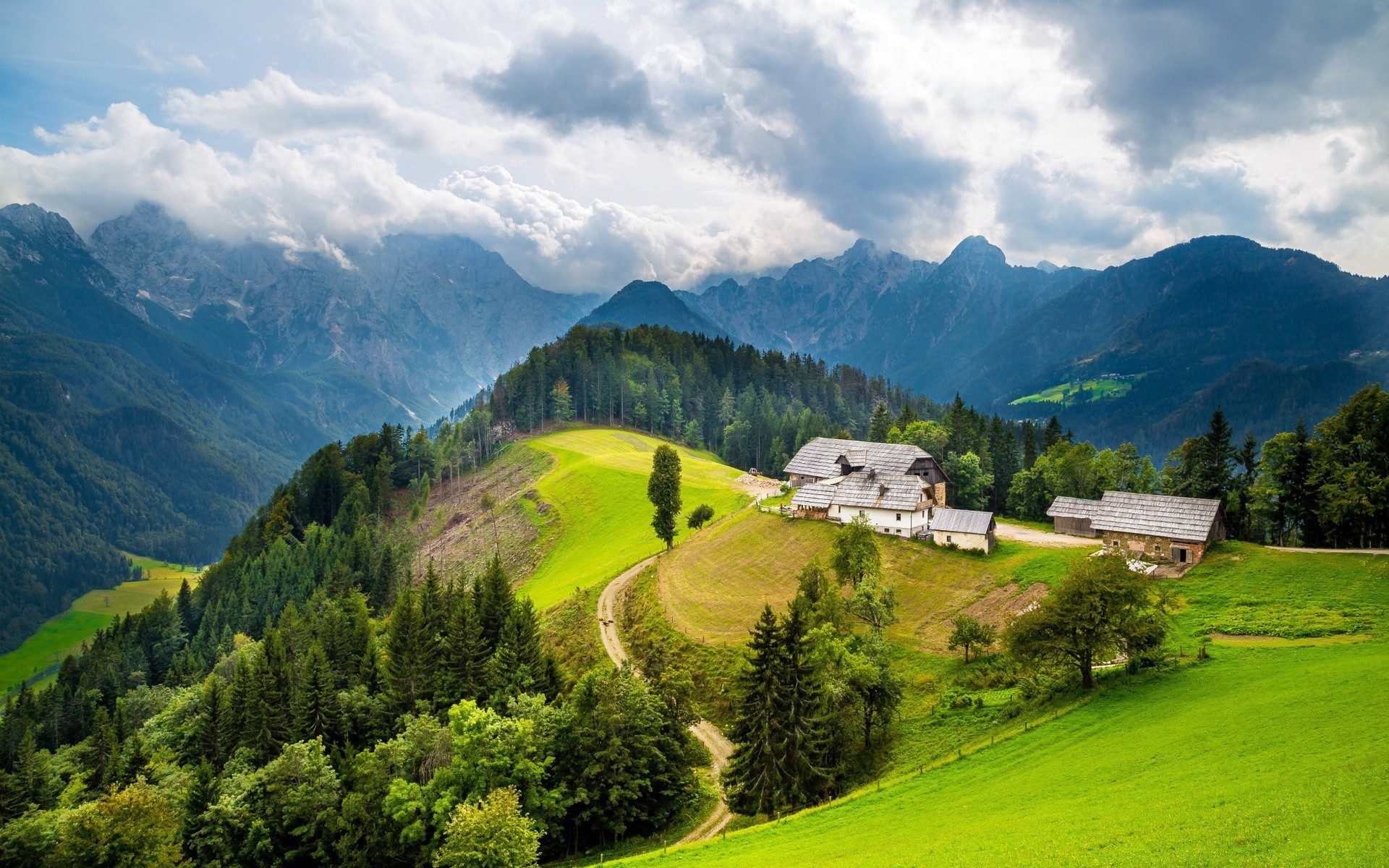 mountains mountain landscape travel valley nature scenic outdoors hill wood sky tree summer grass sight daylight hayfield