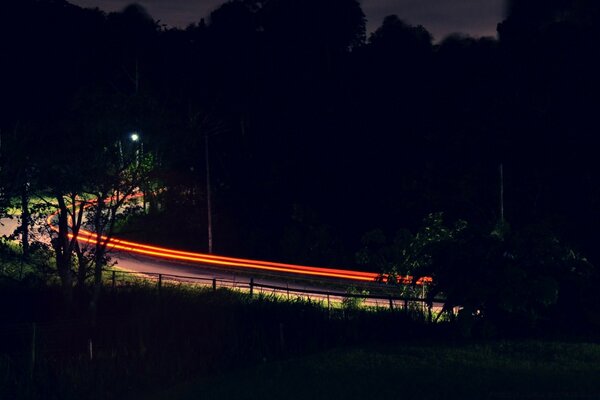 A red-lit highway at night