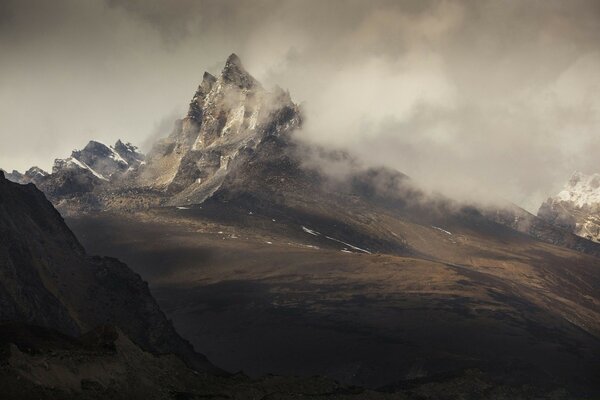 Mountains in a thick fog