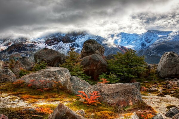 Mountains stretching into the cloudy sky