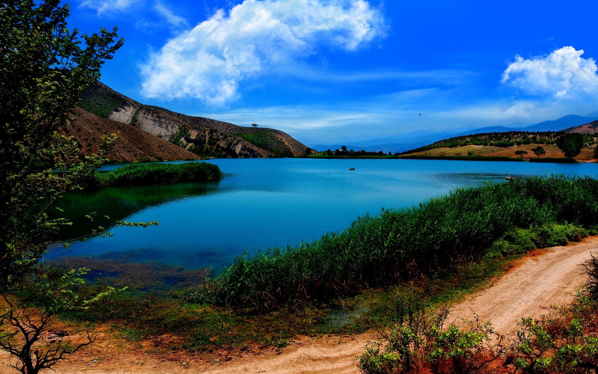 lake water travel nature outdoors sky landscape summer seashore