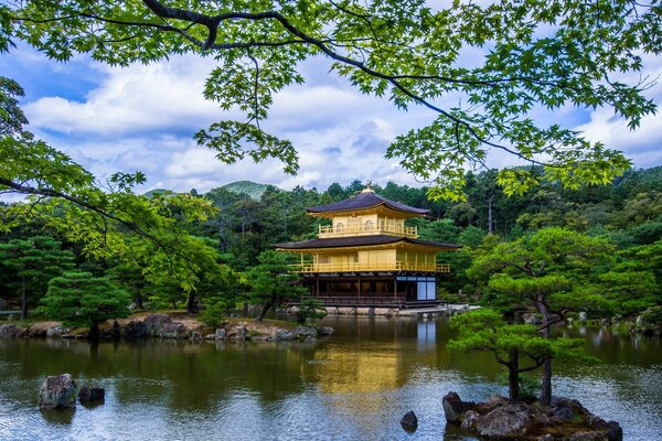 Chinese house in the park on the lake