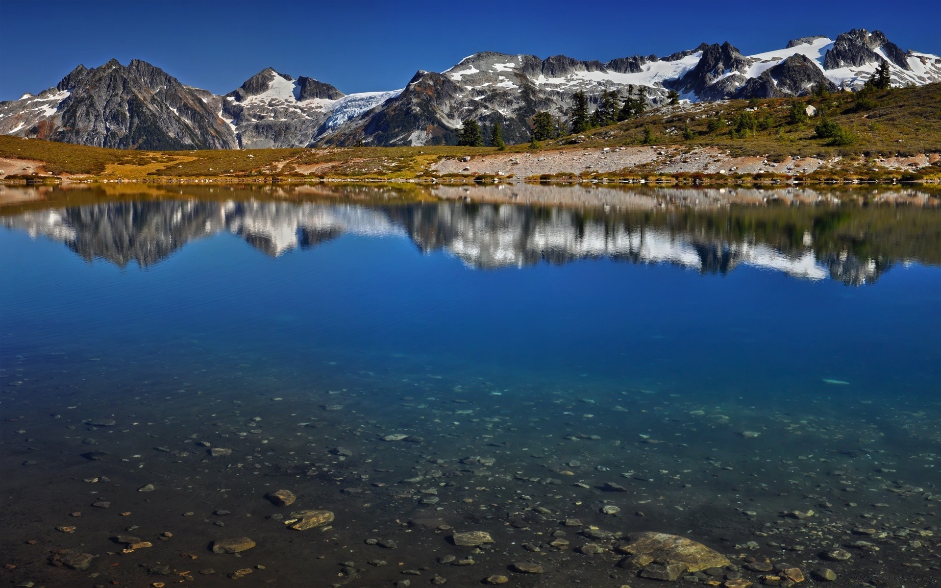 mountains lake reflection landscape water mountain travel snow outdoors sky scenic nature dawn