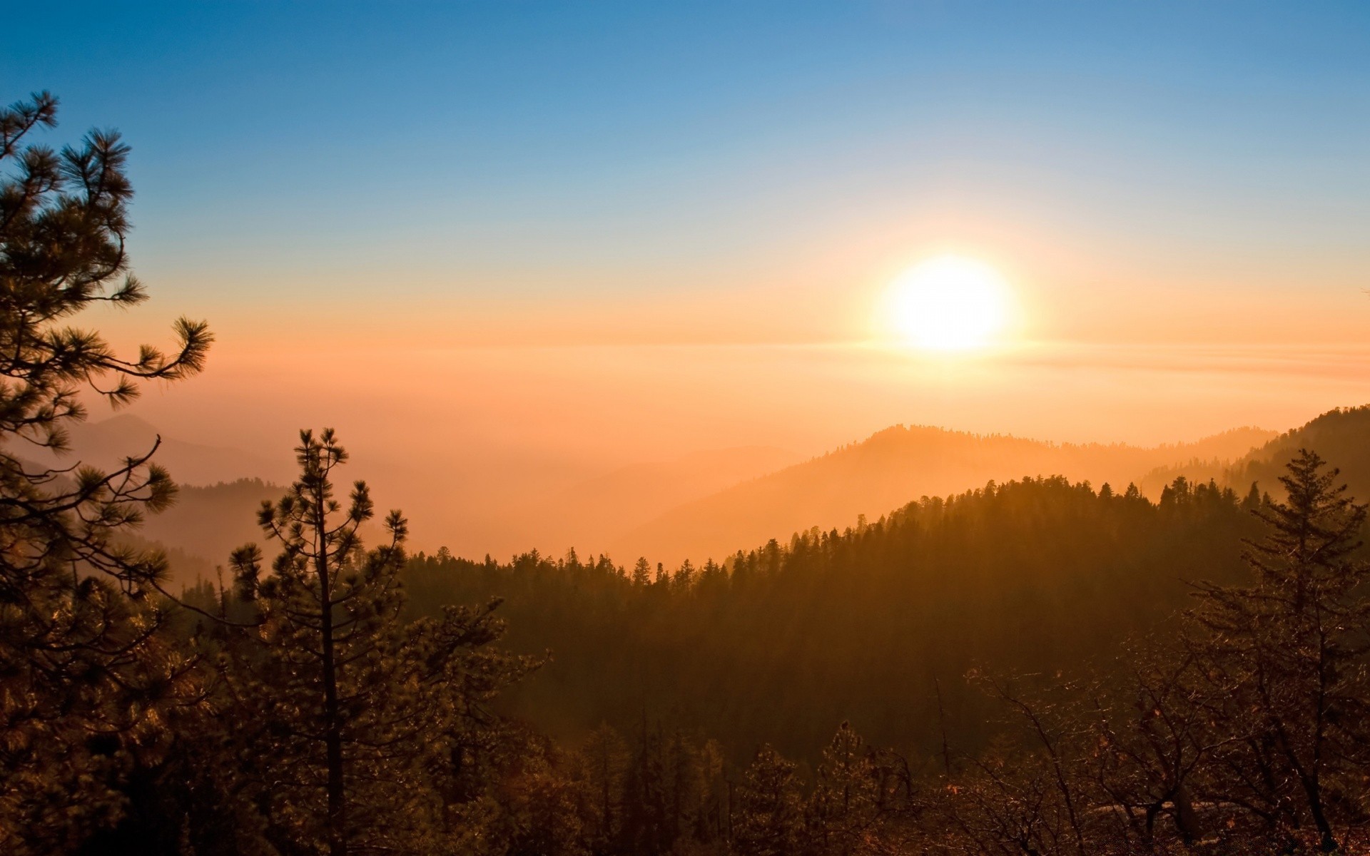 mountains sunset dawn sun fog nature tree landscape mist evening sky outdoors dusk fair weather fall backlit light winter mountain moon