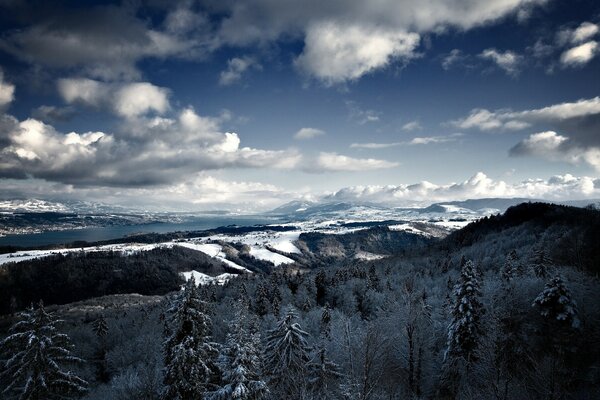 Blue in the mountains. Winter and snow