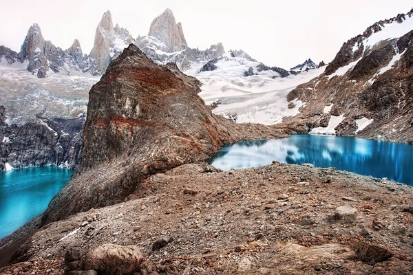 A river in the mountains among the snow