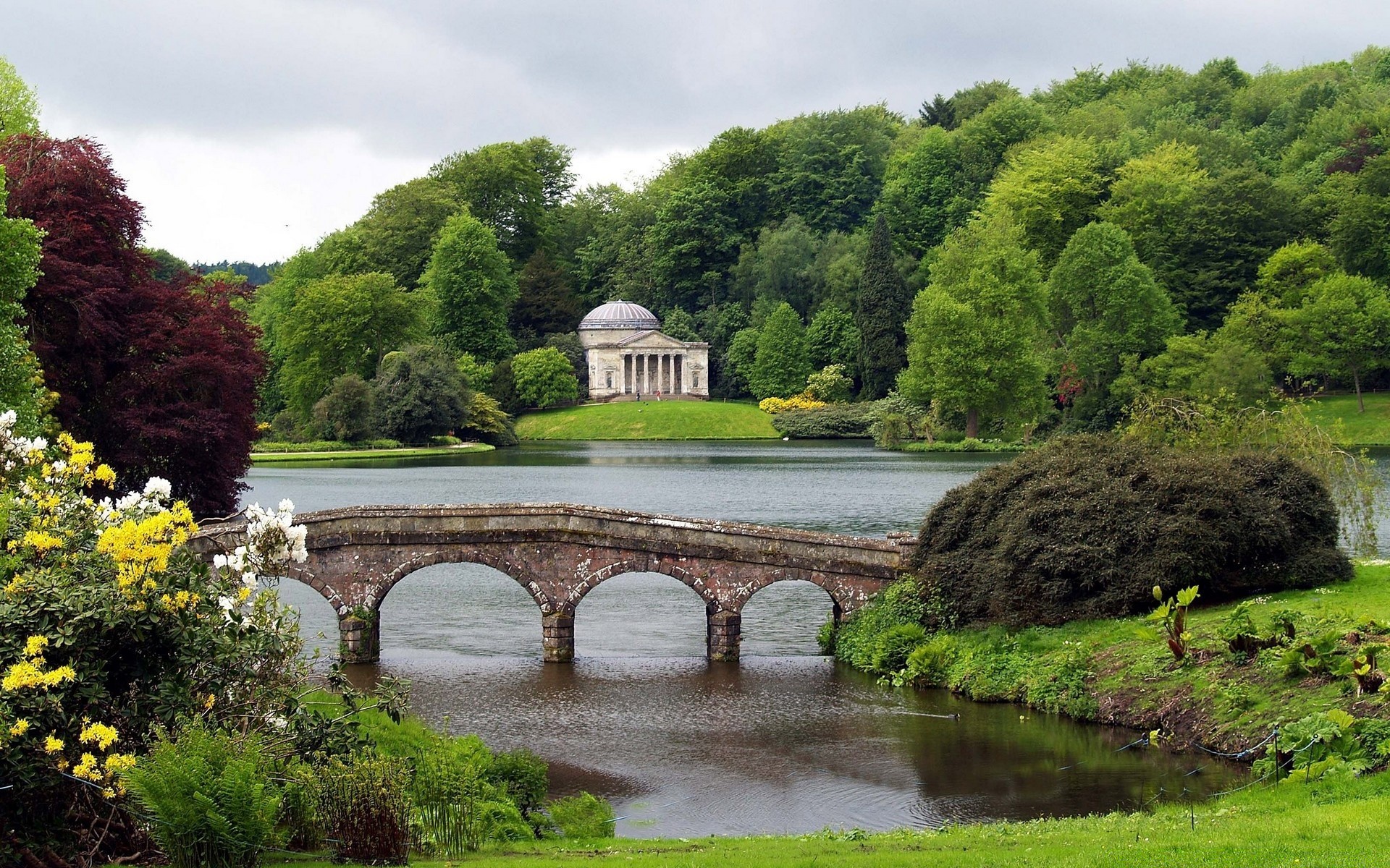 rivers ponds and streams river garden tree architecture park travel water bridge outdoors lake pool grass summer landscape building sky castle lawn scenic