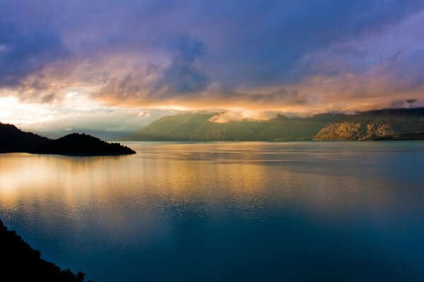 Sunset on the surface of the water