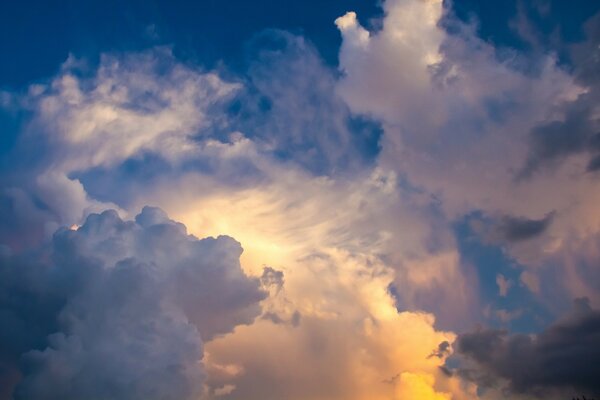 Cumulus clouds in a blue sky