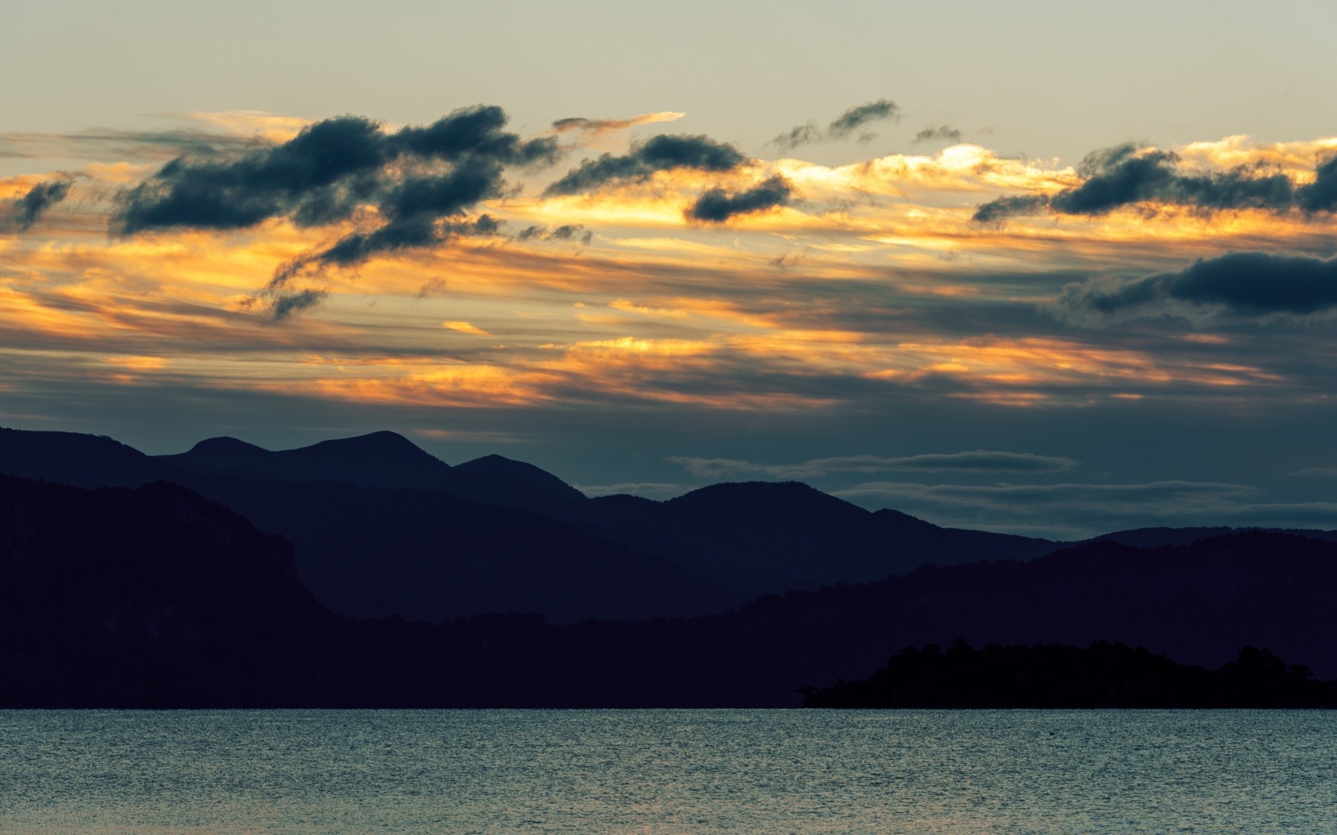 the sky sunset landscape mountain dawn water sky evening dusk sea nature travel lake sun cloud fog ocean beach light island