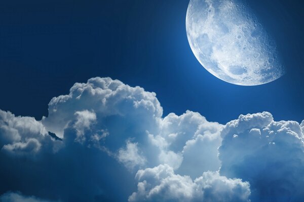 Air clouds in the sky with the moon