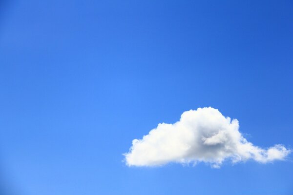 A white cloud in a blue sky