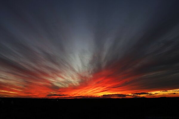 Flaming sky with sunset and clouds