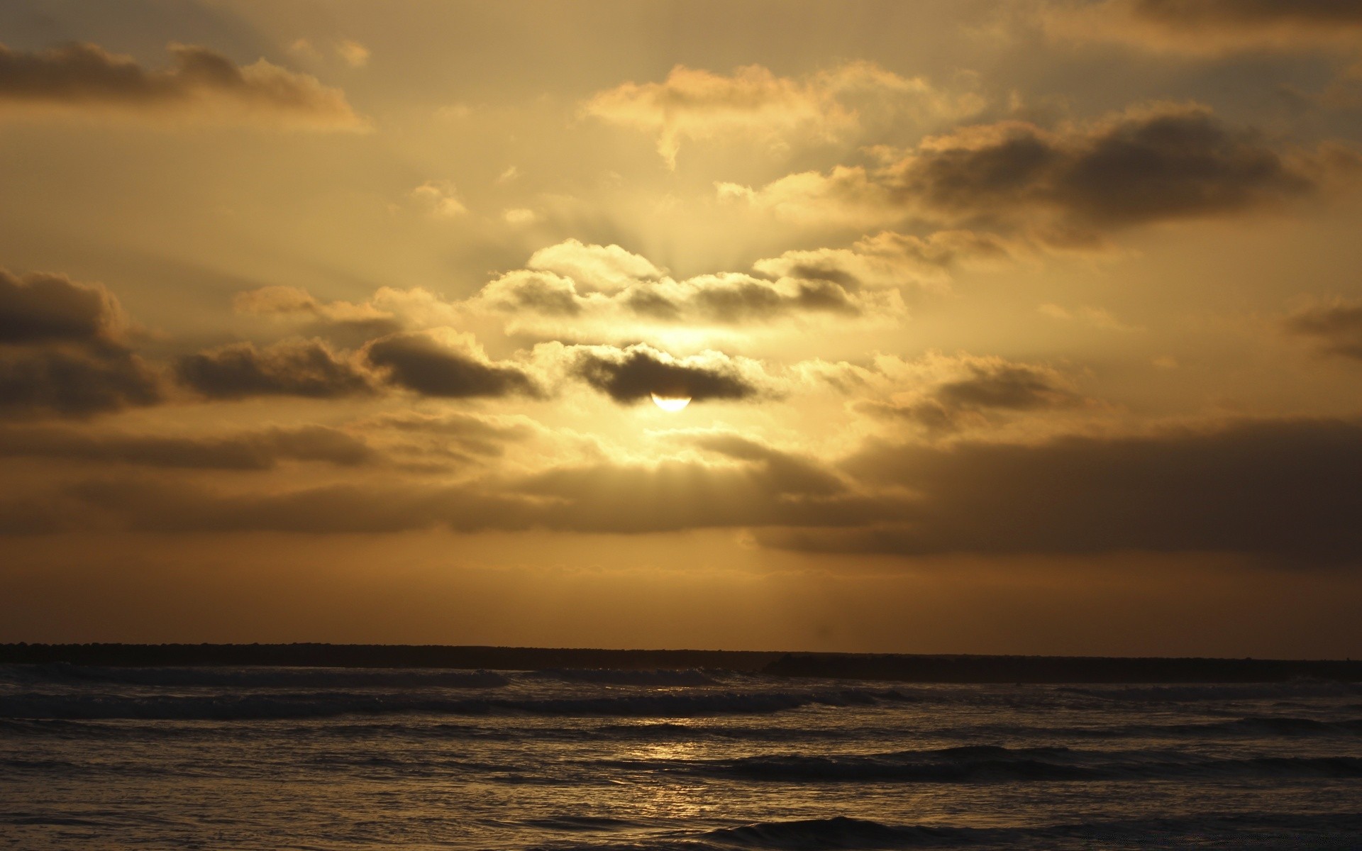 the sky sunset water beach sea dawn sun ocean sky storm dusk seascape landscape nature evening sand