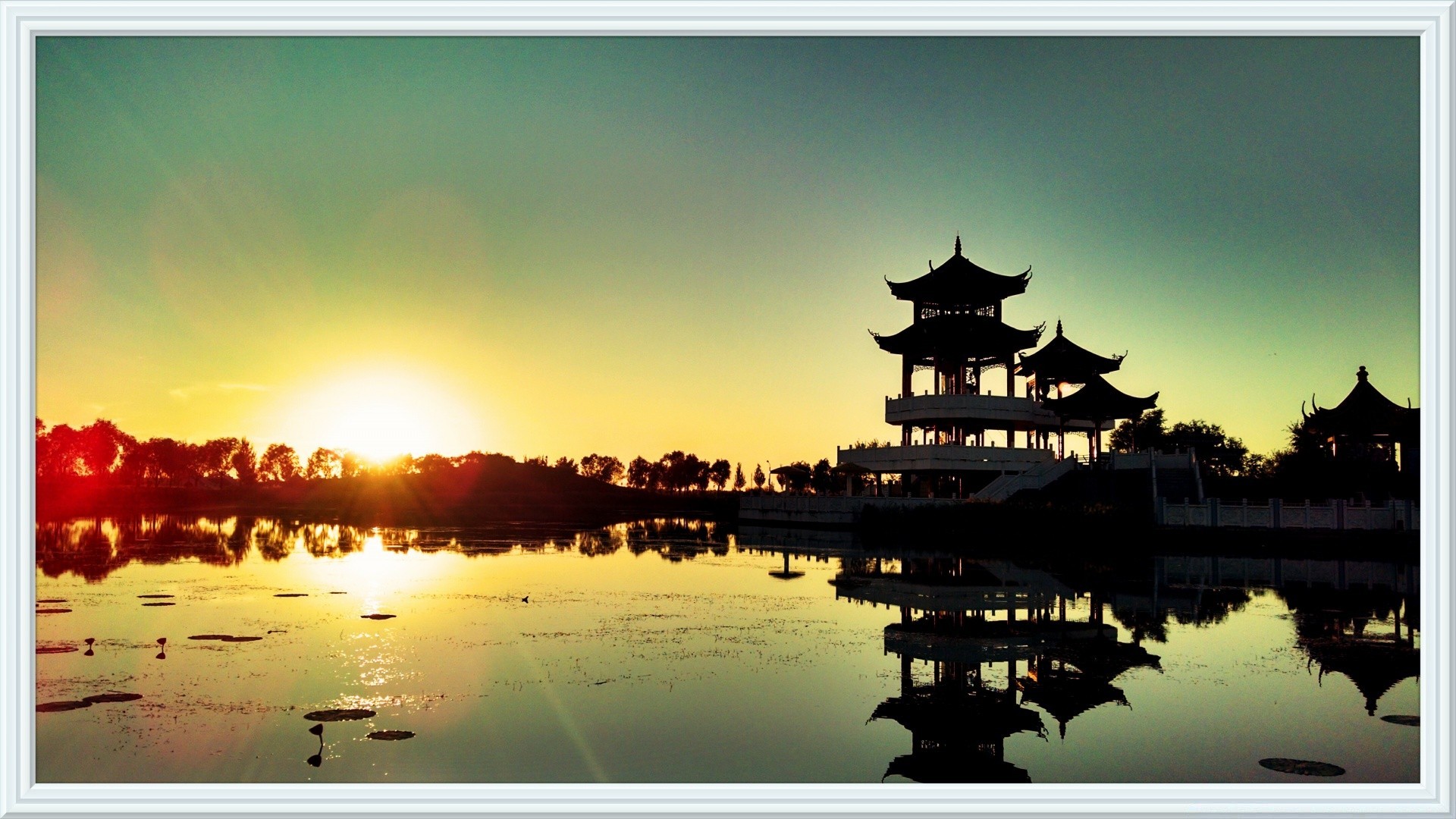 the sky reflection sunset water dawn lake sky river landscape sun sea travel tree silhouette dusk nature evening