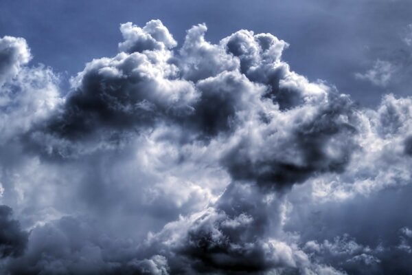 Gloomy sky with gray clouds and clouds