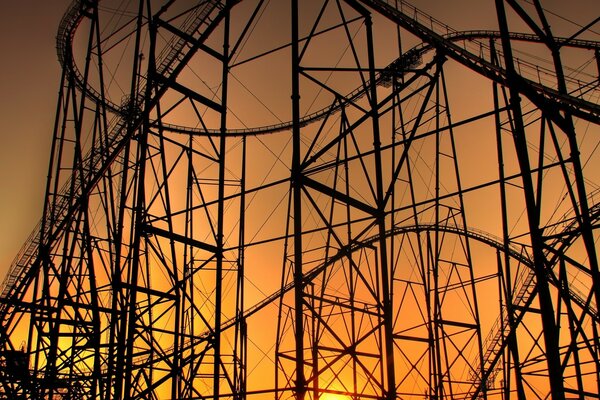 Silhouette of a power plant in the sunset sky