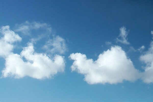 White clouds in a blue sky