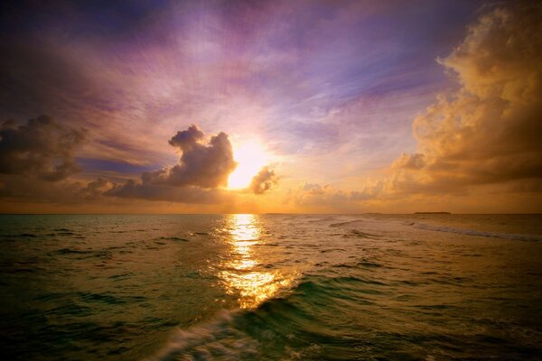 Sea waves in sunlight