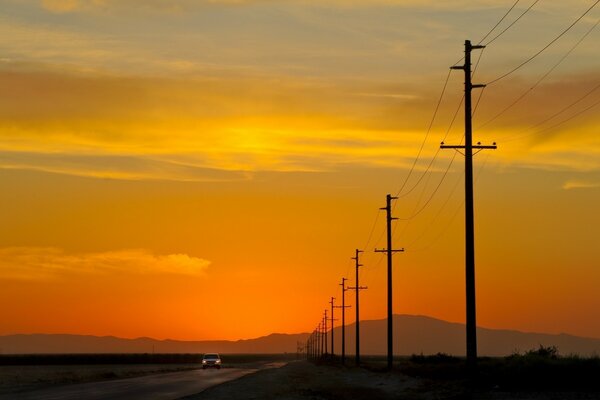 There are poles along the road