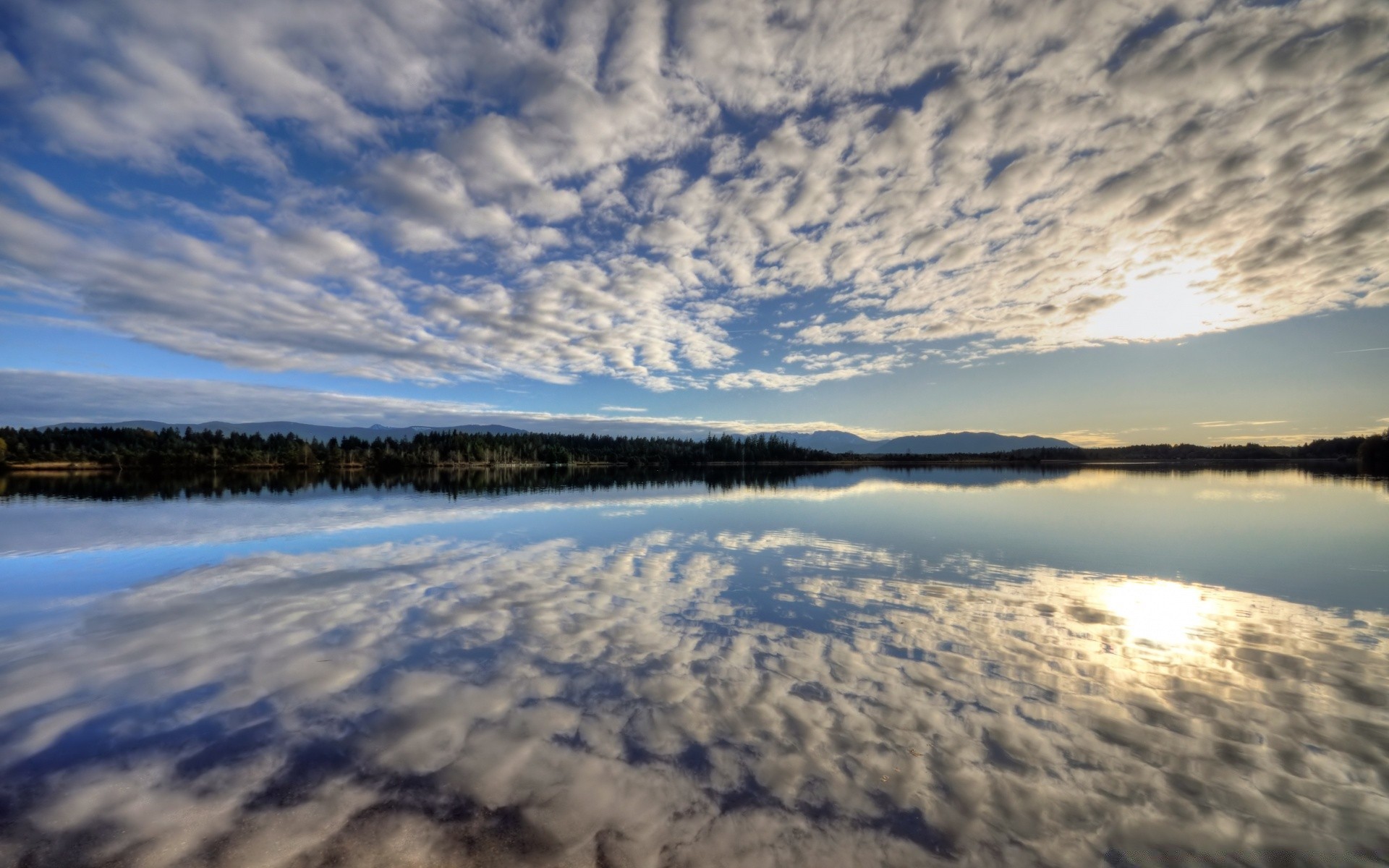 the sky water sunset lake landscape dawn reflection sky evening outdoors nature beach snow winter ocean dusk sea travel