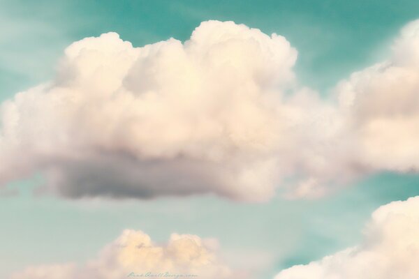 White big clouds following each other