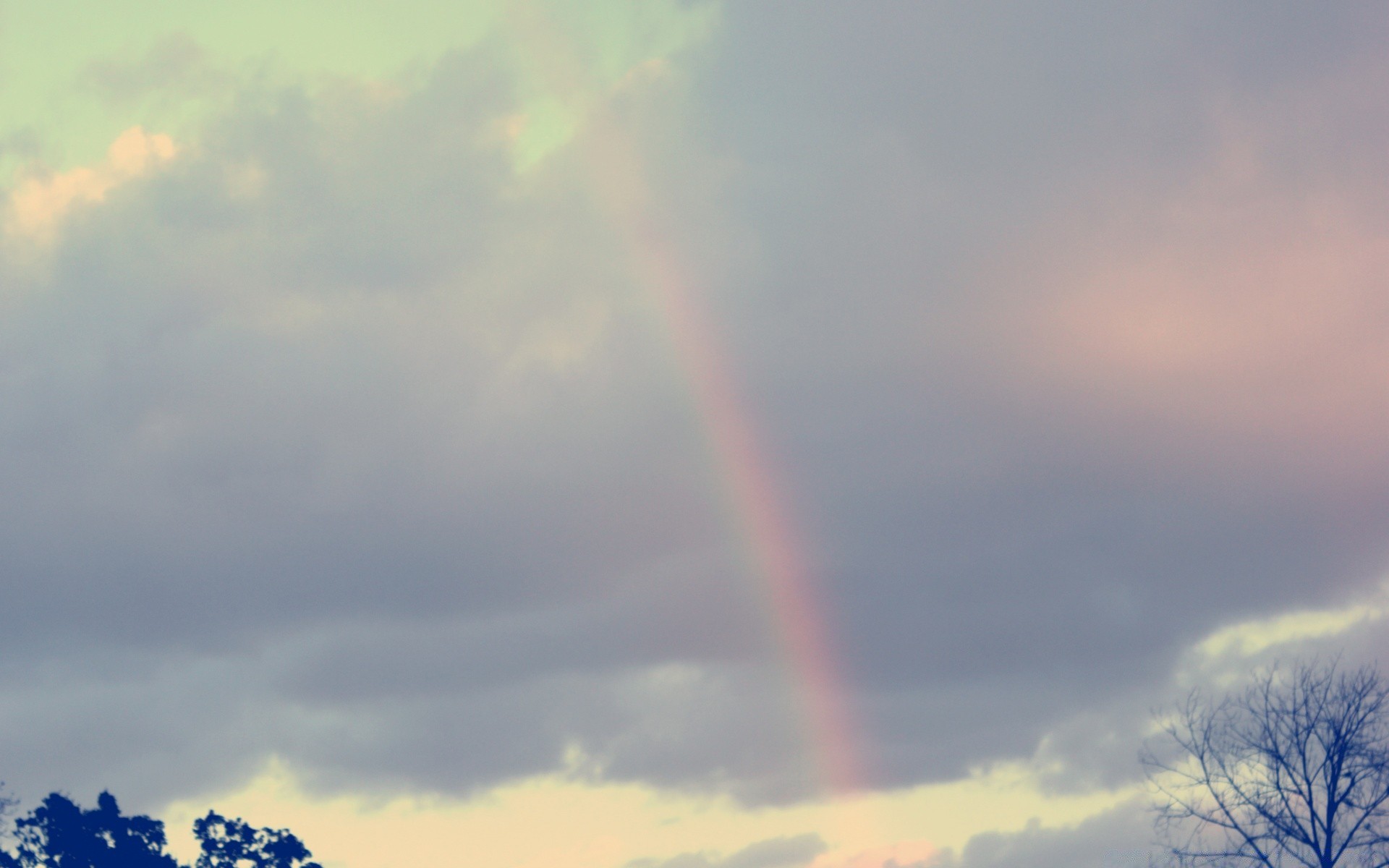 the sky sky rainbow landscape weather daylight storm sun outdoors sunset nature rain light smoke environment