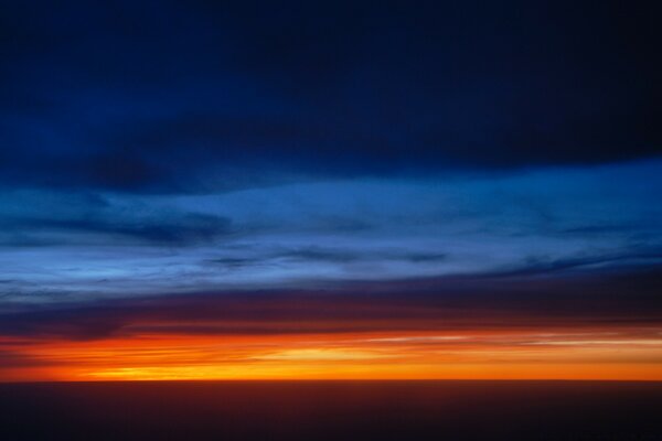 The sky is at dusk against the setting sun