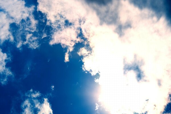 Blue sky and fluffy clouds