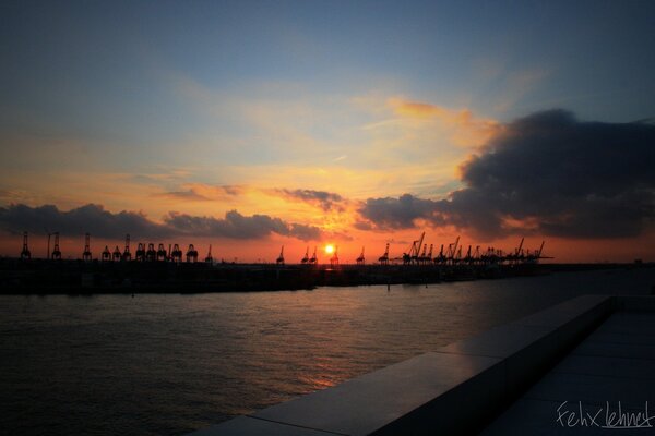 Sunset over the river in the evening